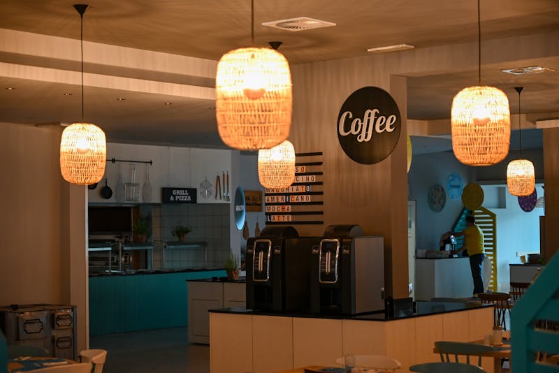 Mod Pizza kitchen team preparing fresh pizzas with quality ingredients